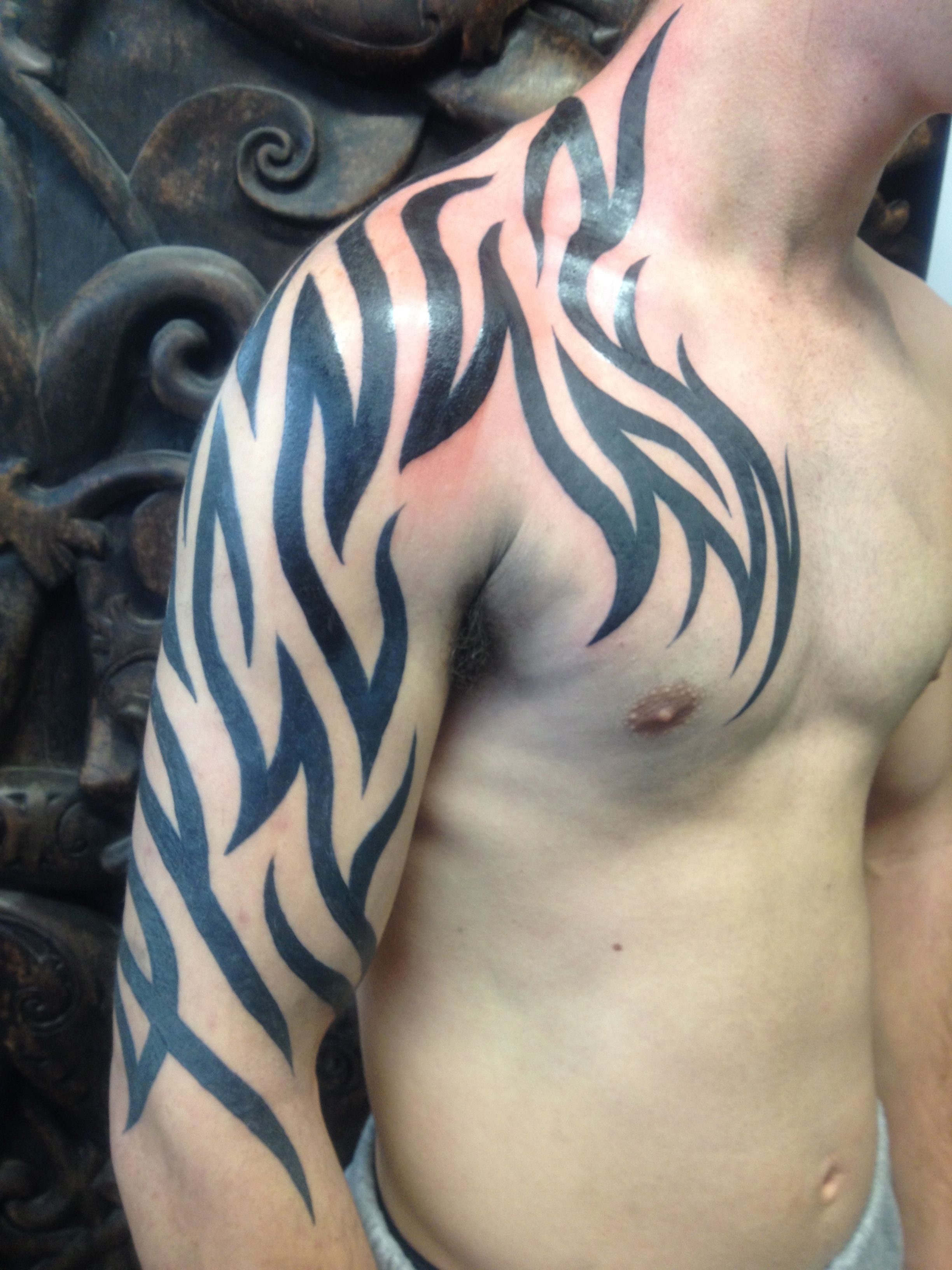 Best Tribal Arm Tattoo Designs for Men - The Xerxes
