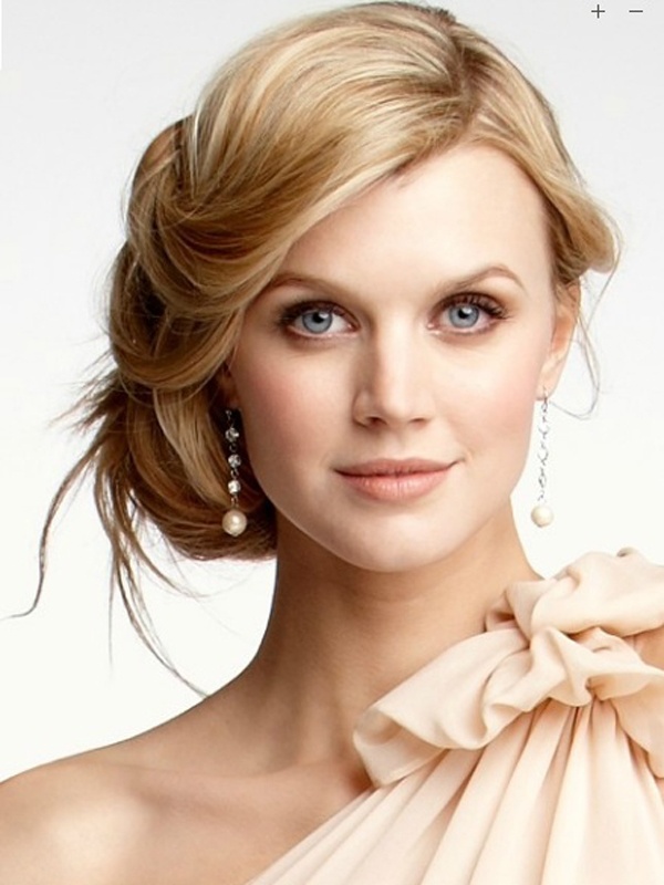 Image for wedding guest hairstyle for round face